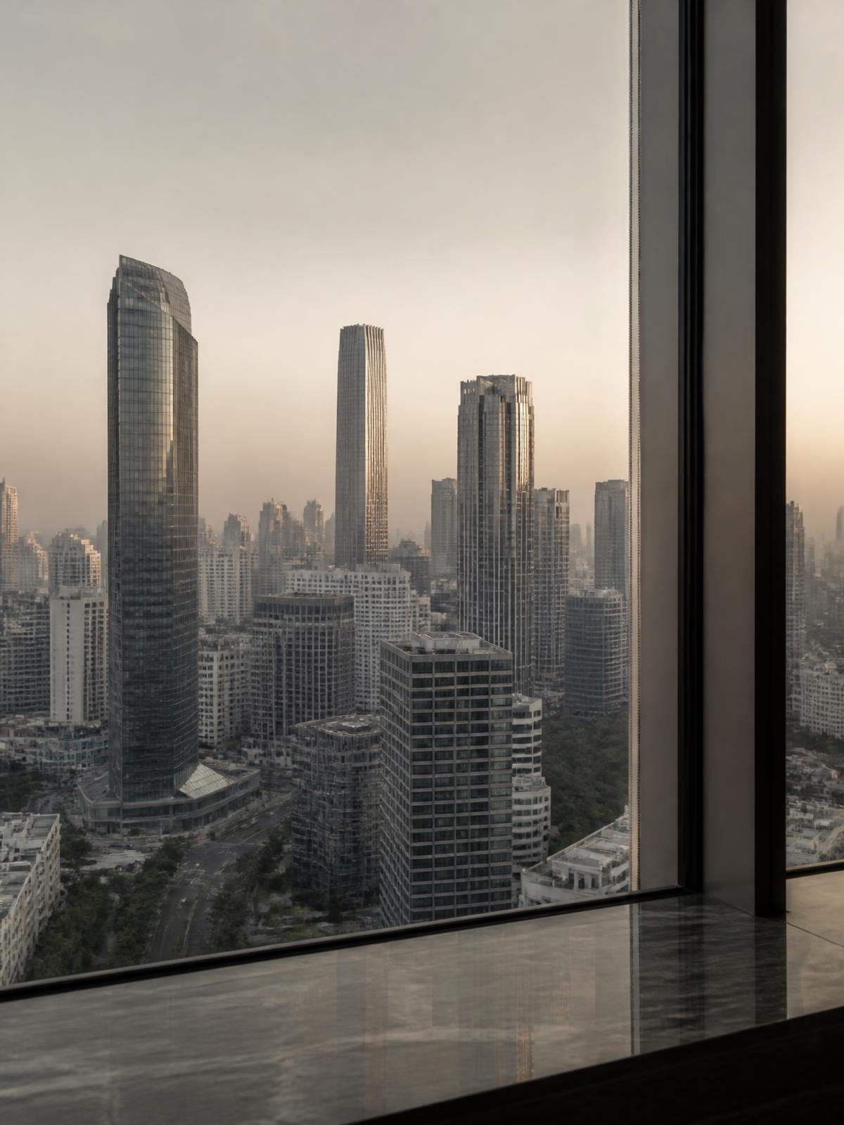 International business district seen through a tall window in early morning haze.